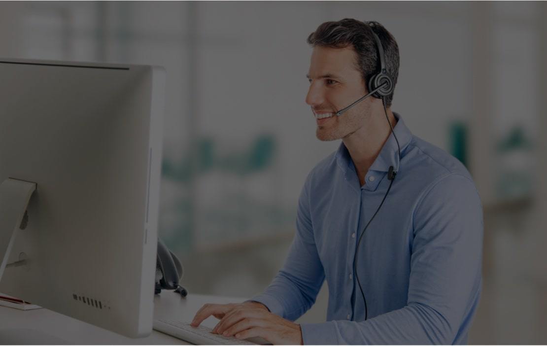 man wearing corded office headset